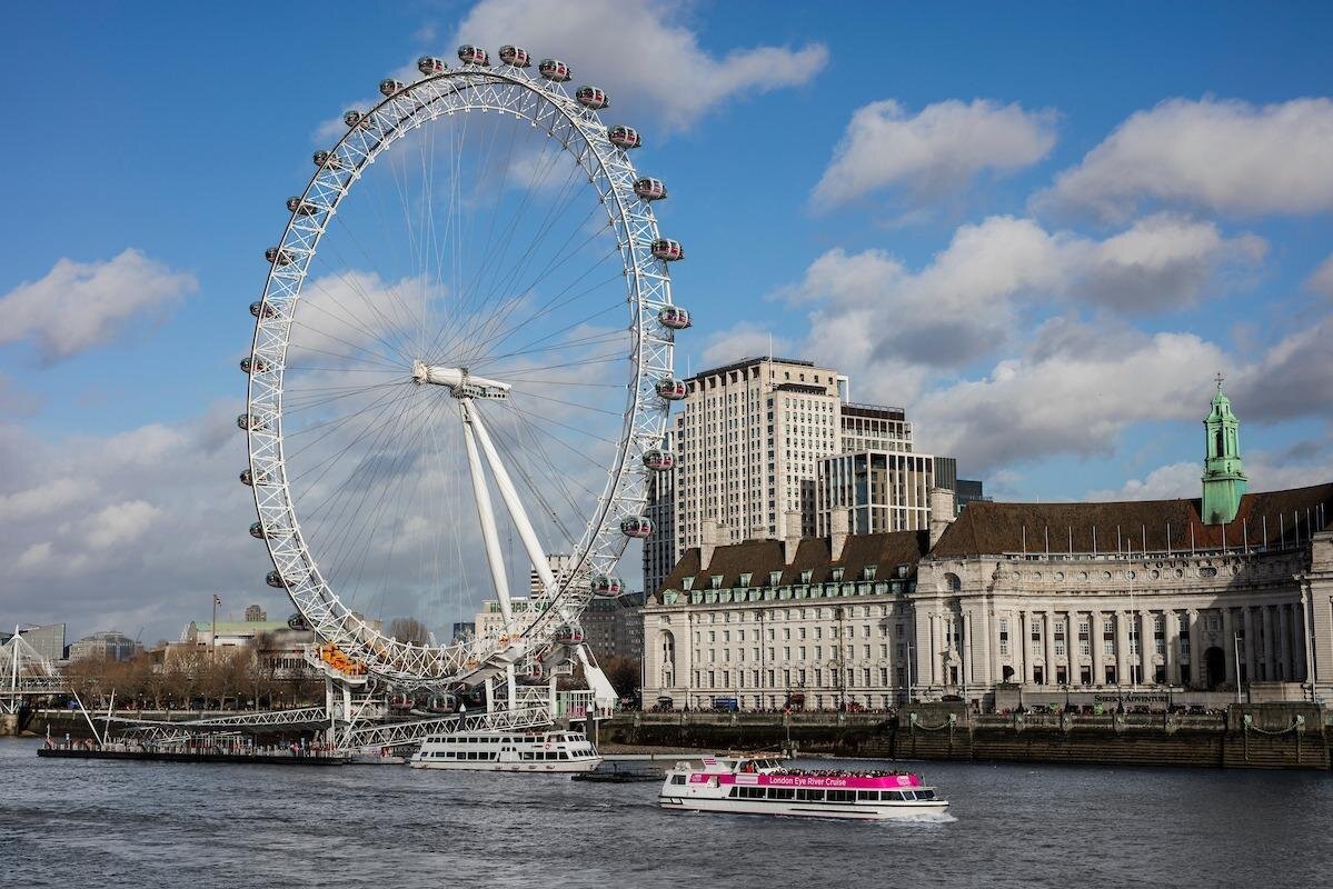 London Eye: Iconic riverside Ferris wheel offering skyline views