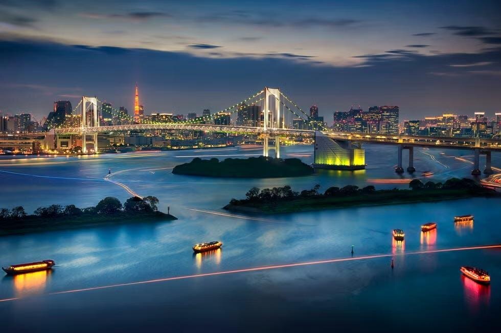 Asian cruise deal featuring a ship sailing toward exotic coastlines with views of ancient temples, modern city skylines, and tropical island landscapes