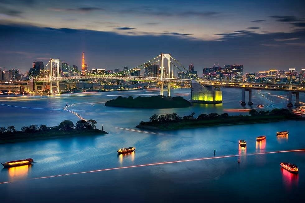 Asian cruise deal featuring a ship sailing toward exotic coastlines with views of ancient temples, modern city skylines, and tropical island landscapes