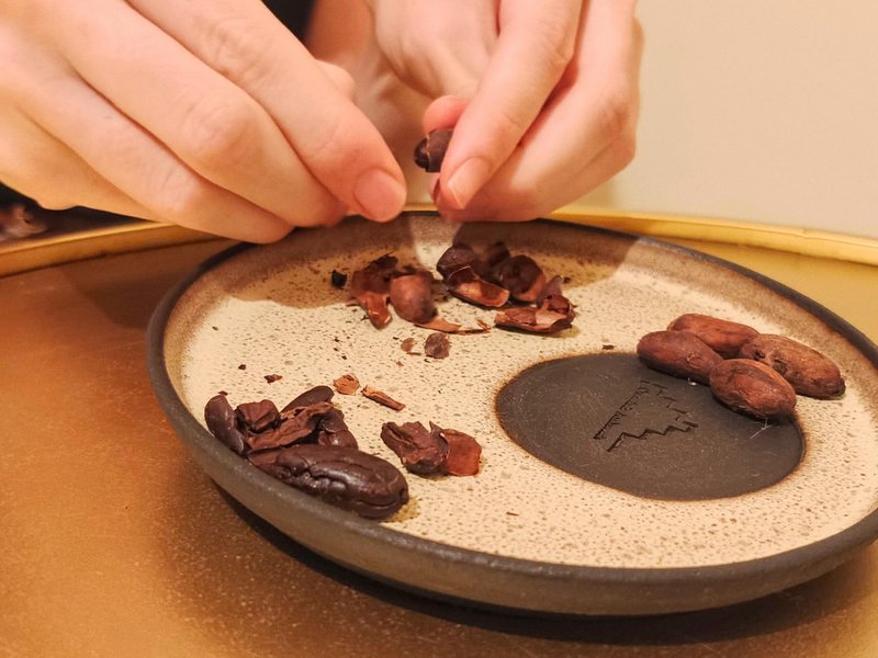 breaking cacao beans