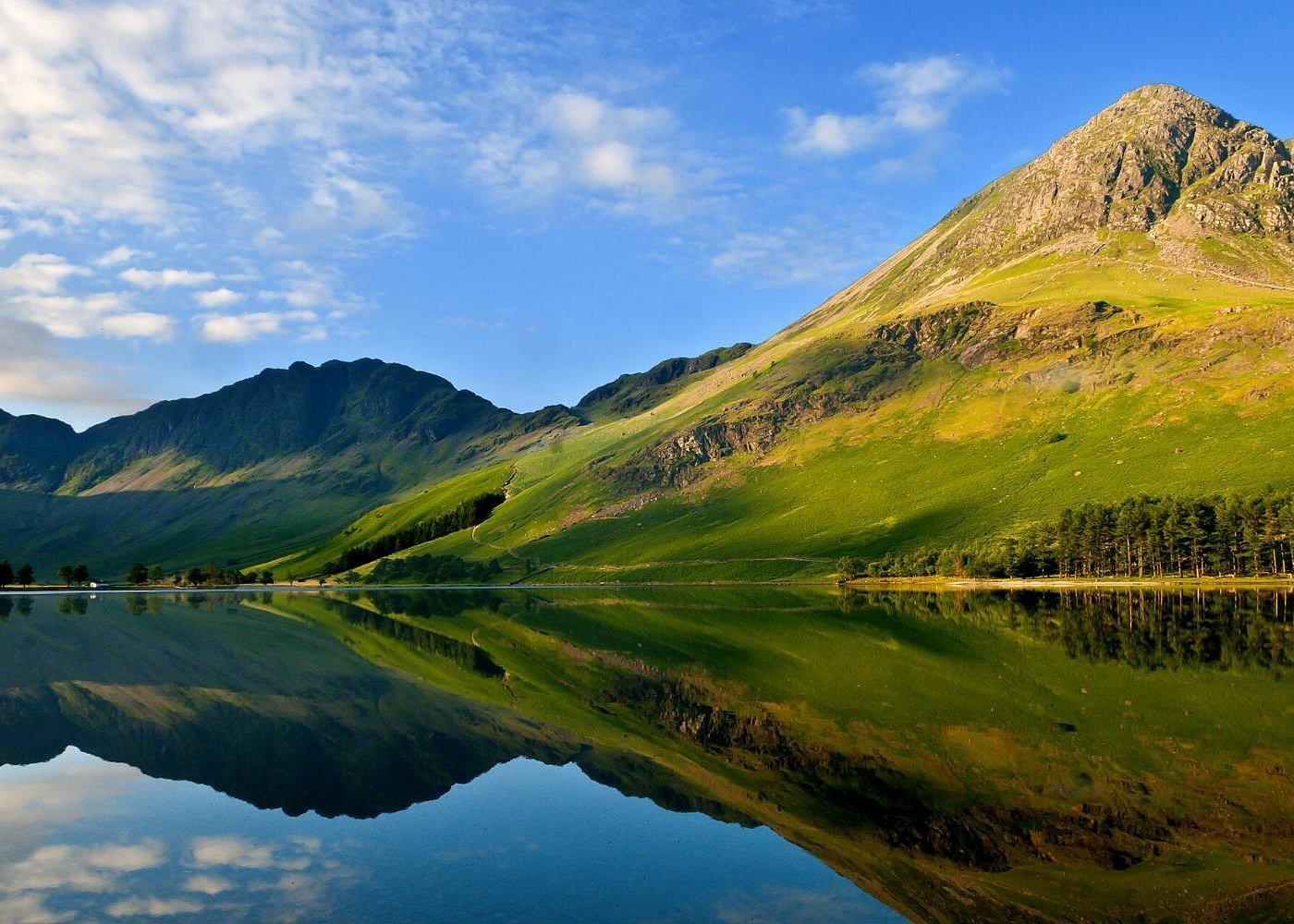 Serenity Uncovered: Peaceful Retreats & Tranquil Journeys 8 Lake District, UK: Gentle walks among hills and lakes.