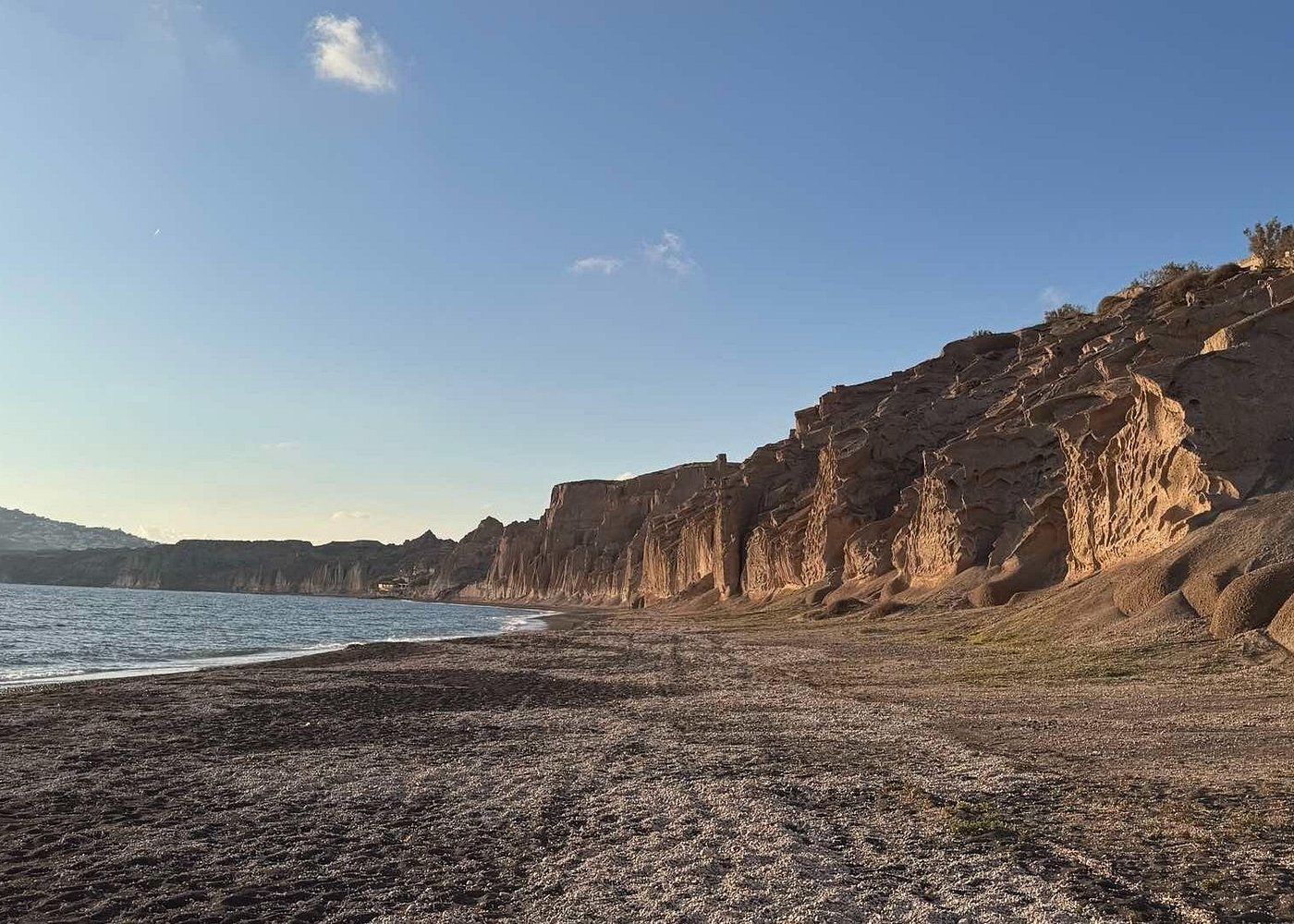 Vlychada Beach – Quieter, with lunar-like cliffs and natural beauty