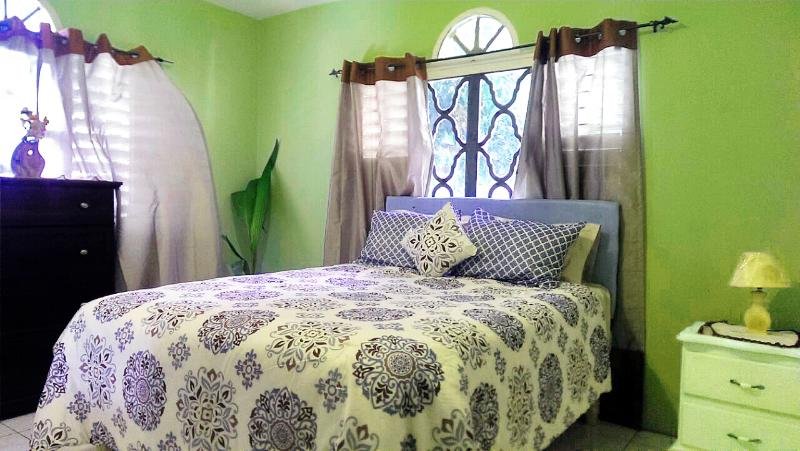 Comfy, spacious bedroom.