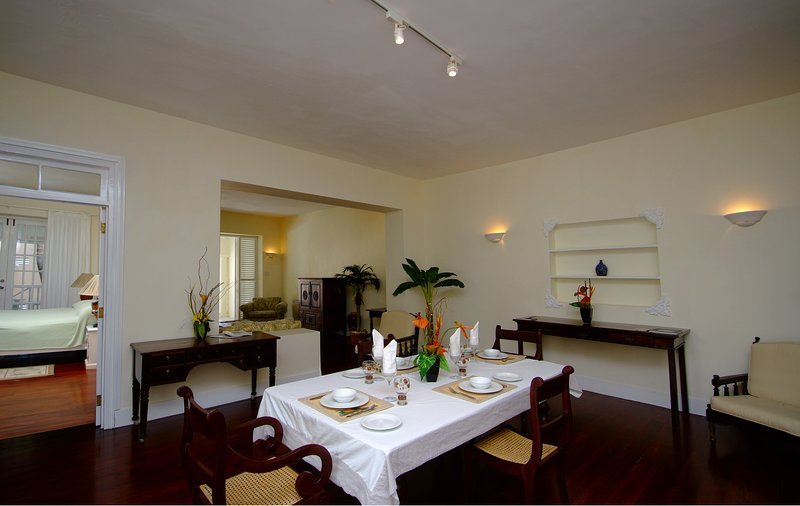 Colonial style dining & living area with antique furniture in stylish House Courtyard