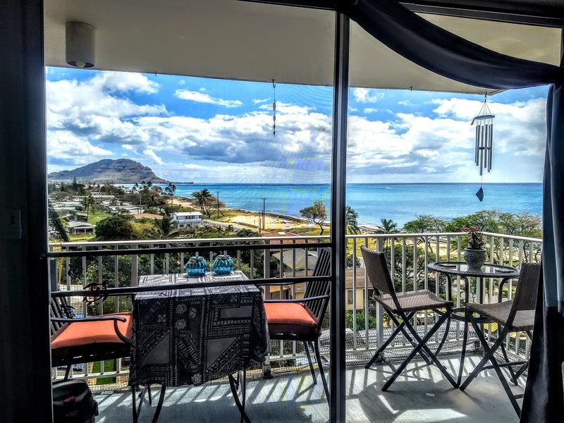 Lanai view and outdoor dinning  with a corner Sunset happy hour table