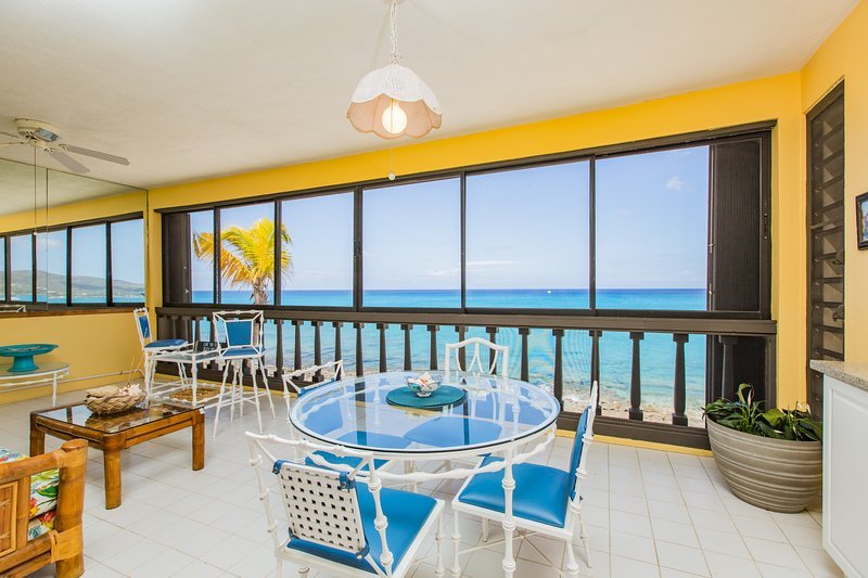 Condo private balcony with 180 degree view of the Caribbean Sea