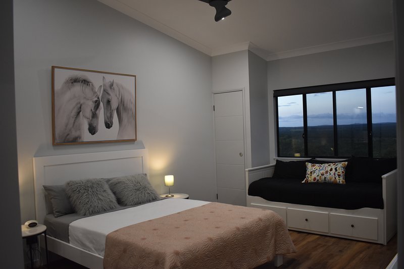 Bedroom with queen bed and daybed which opens into a king. Plus amazing views!