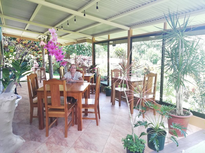 Guest Terrace, open day and night. Breakfast.10- chairs, 4-bar stools, 4-folding chairs provided.