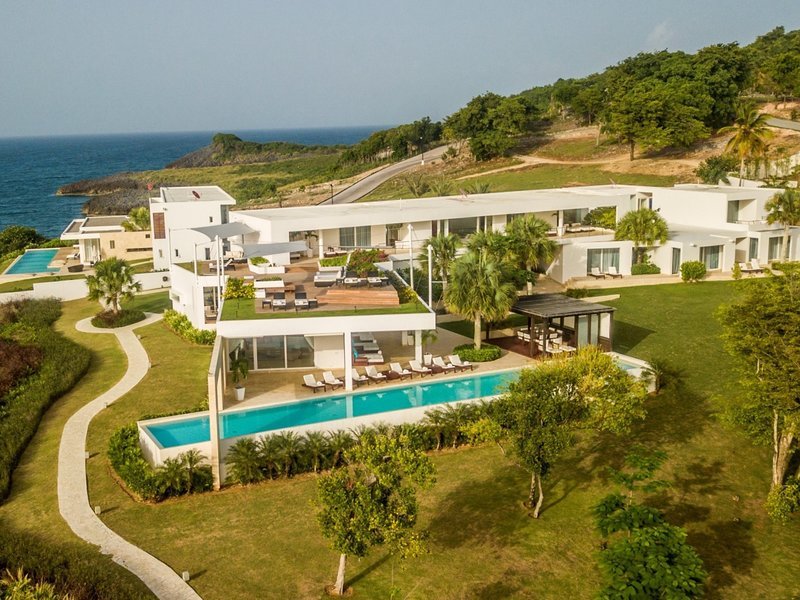 Luxury Contemporary 6-bedroom Oceanfront Villa with semi olympic infinity pool