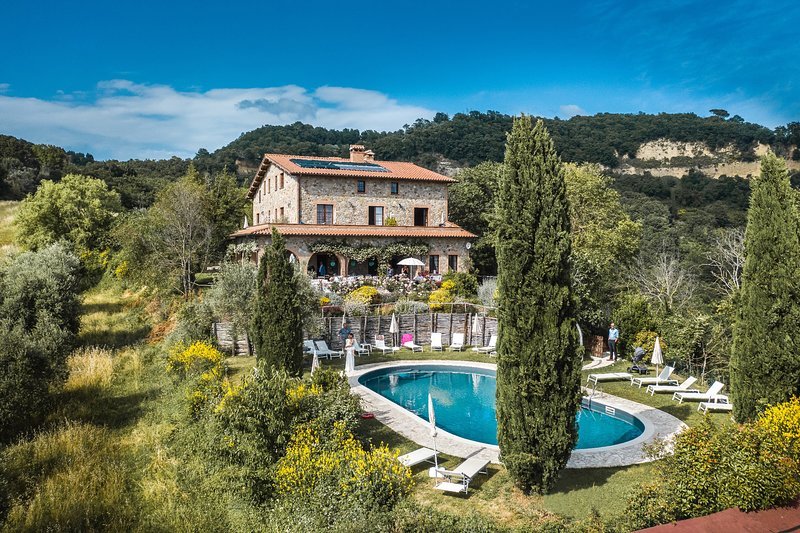 Casa San Carlo with it's large pool overlooking the valley and Tuscany.