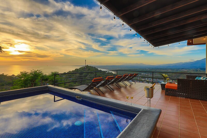 A spectacular  terrace surrounded by breathtaking panoramic ocean, jungle, and mountain views.