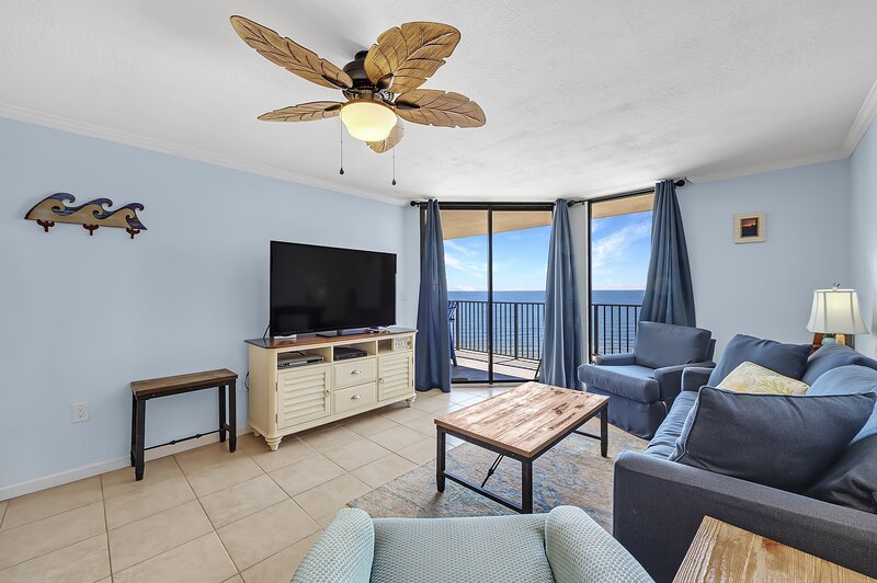 Living Area with Full Size Sleeper Sofa and access to Private Balcony