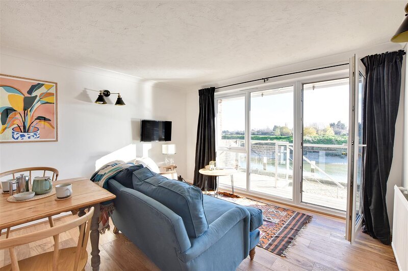 The view of the River Rother and the private balcony 
