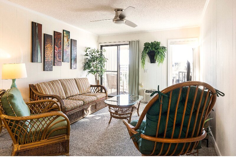 Living room leads to the porch with the ocean view